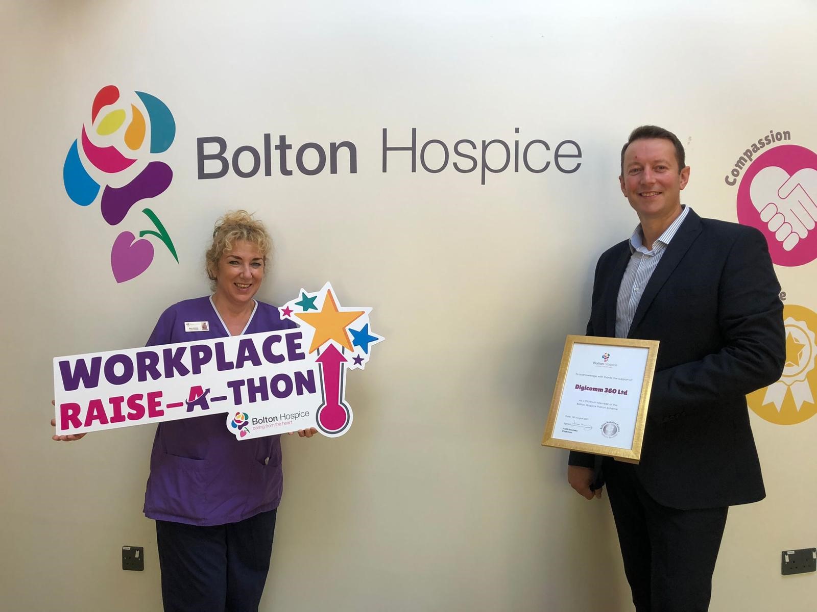 Bolton Hospice Creative Therapist, Mary Stubbs with Digicomm 360 Managing Director, Mark Pollitt
