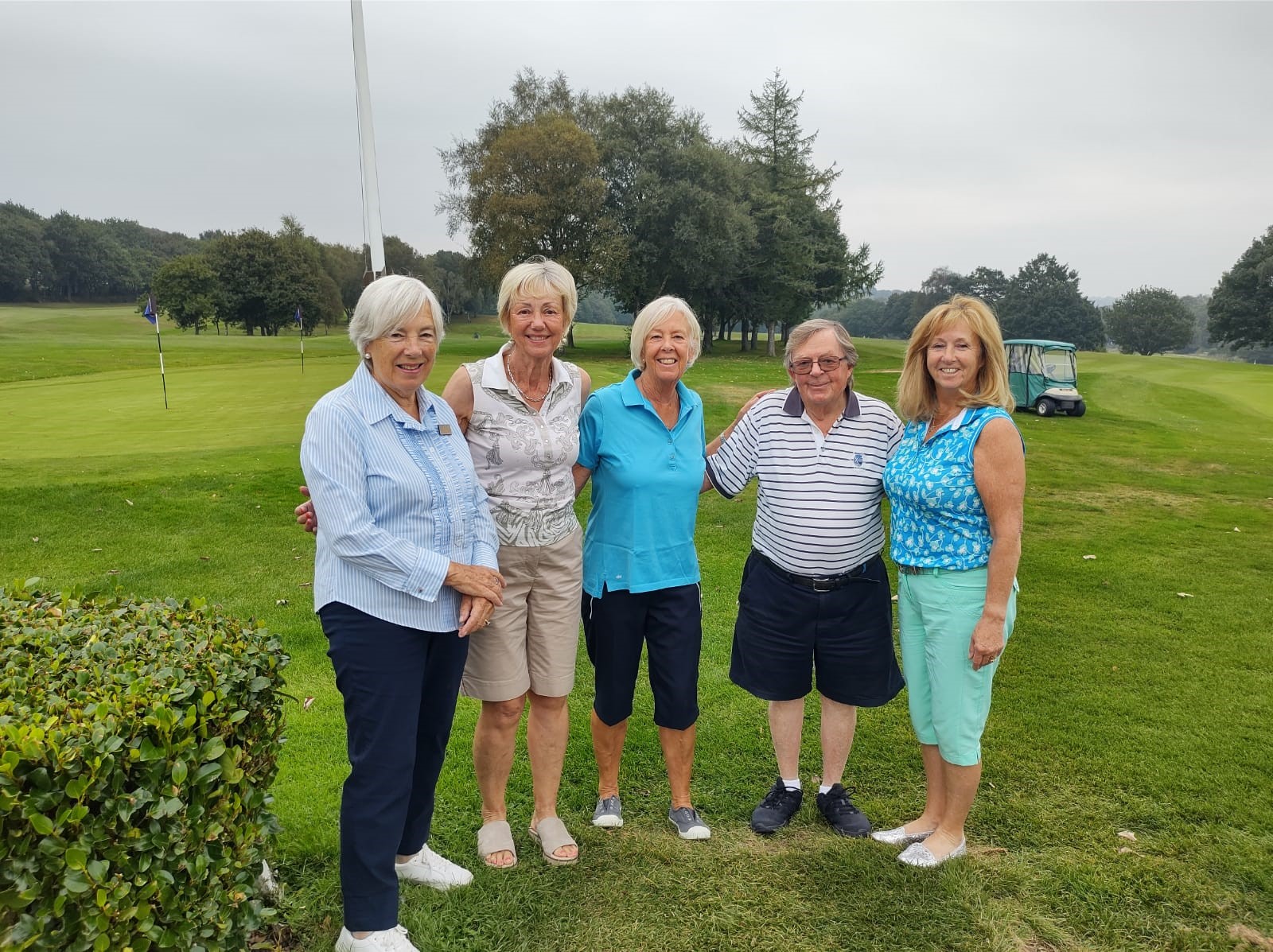 Participants on the green at the Bolton Hospice Golf Day