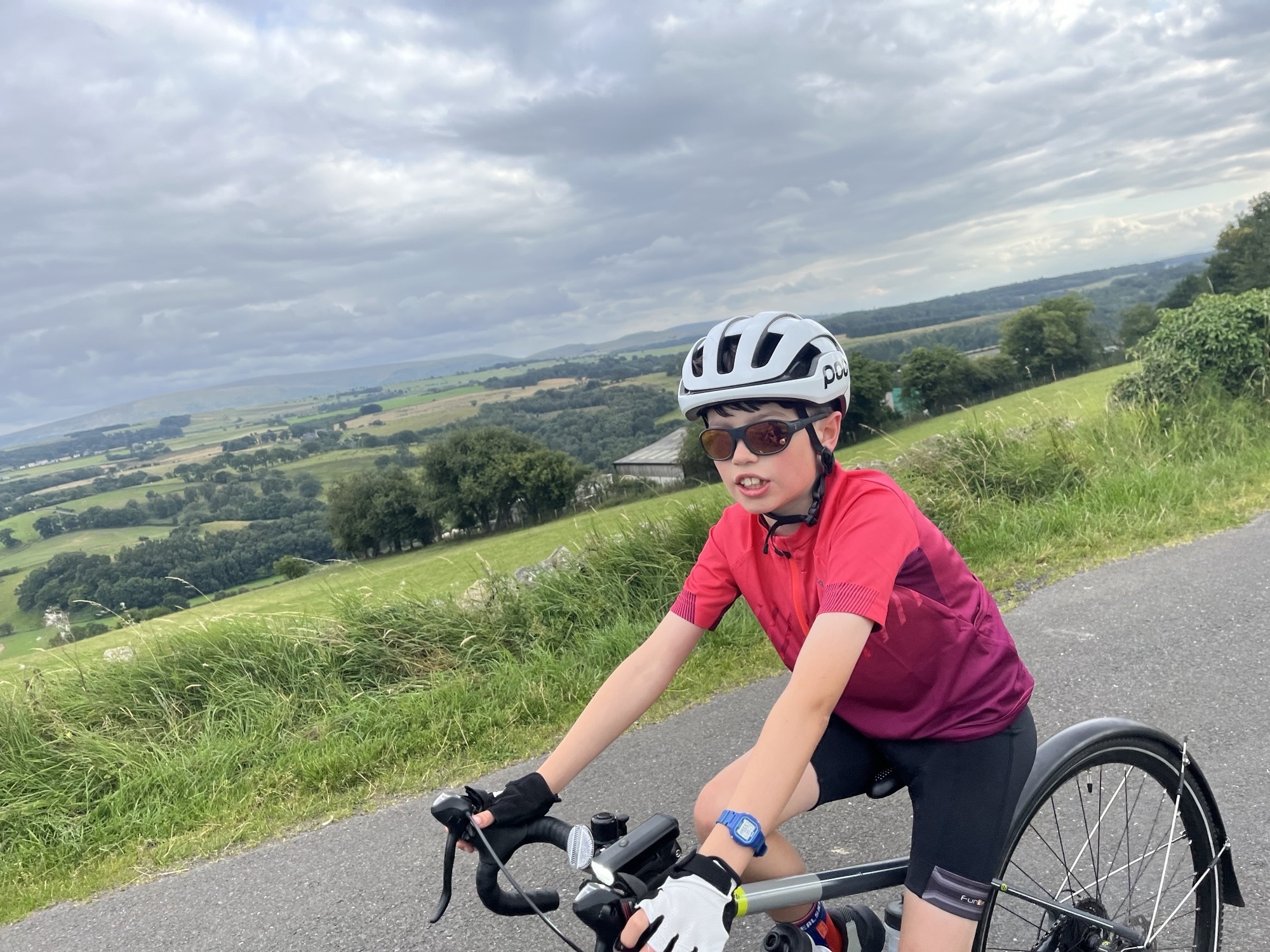 jack cycling on country road