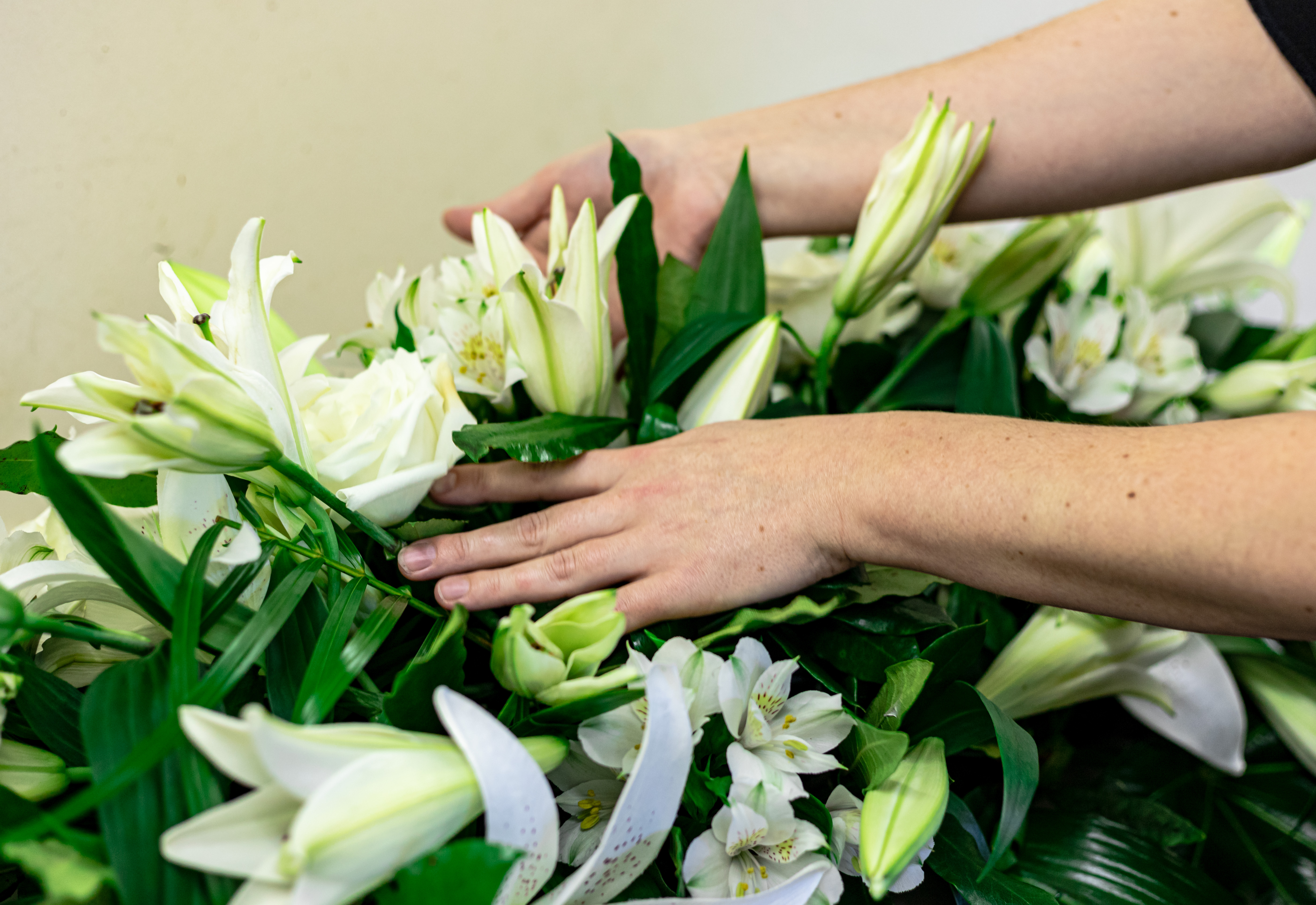Volunteer arranging flowers