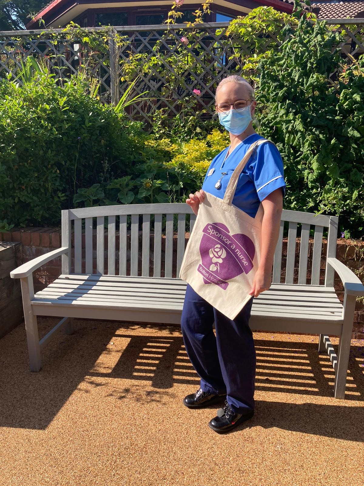 Nurse with Sponsor a Nurse tote bag