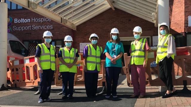 Bolton Hospice staff outside the wellbeing hub