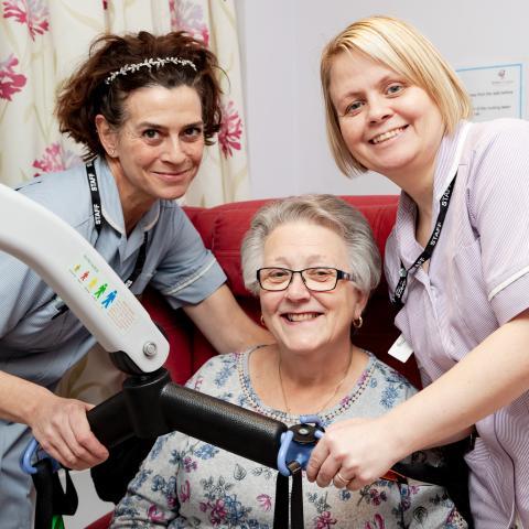 Two nurses with woman