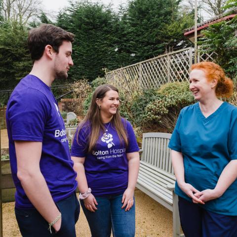 Group of staff members talking 